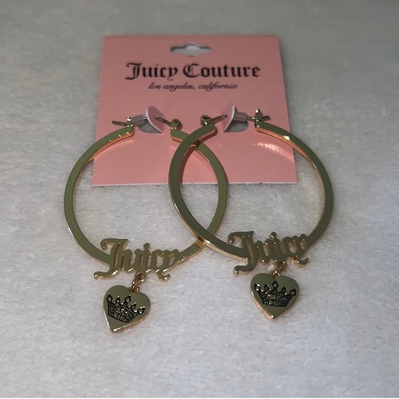 A NWT Juicy Couture Earrings, gold
“Juicy” dangling hearts with crowns. - Picture 1 of 2